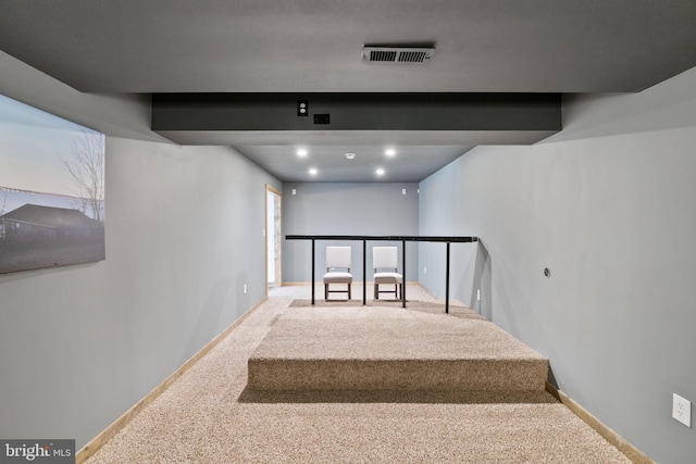 staircase with carpet flooring, baseboards, and recessed lighting
