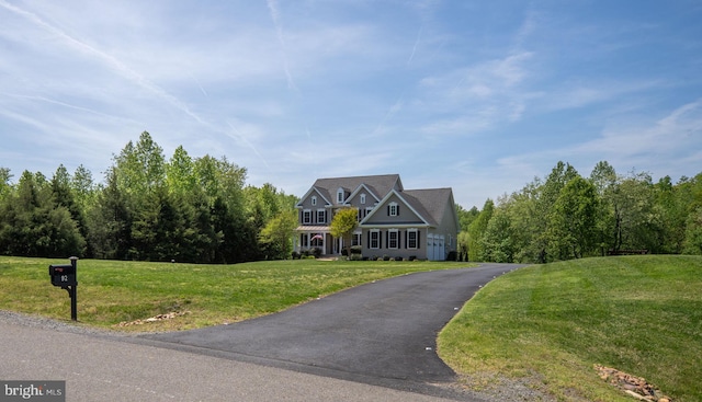 view of front of home with a front yard