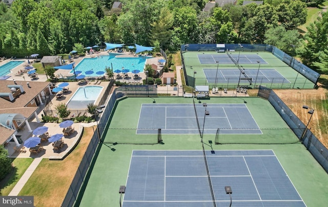 view of tennis court with fence