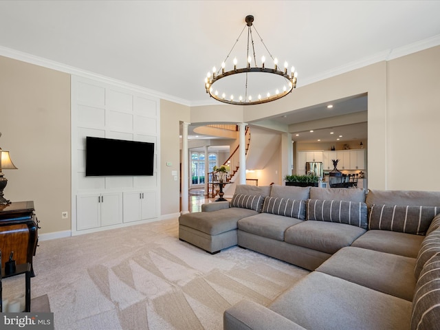 living room with decorative columns, ornamental molding, light colored carpet, baseboards, and a chandelier