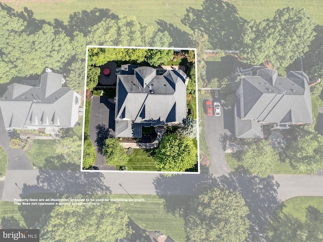 aerial view of property and surrounding area with property boundaries highlighted