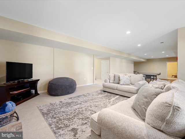 carpeted living room featuring recessed lighting and baseboards