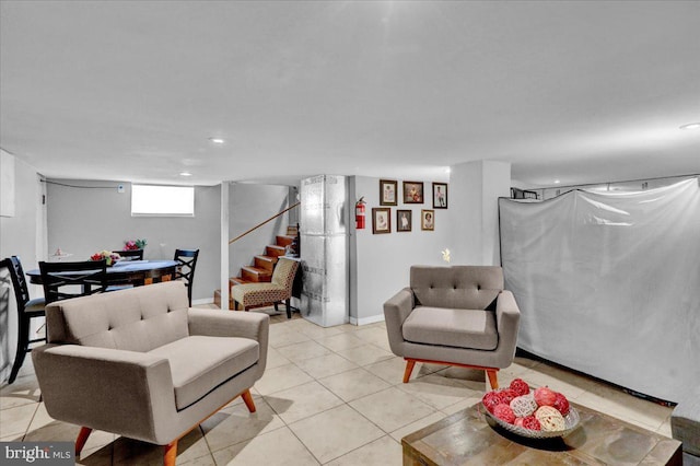 living area with stairs, light tile patterned flooring, and recessed lighting