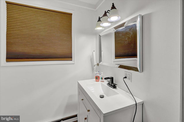 bathroom featuring a baseboard radiator and vanity