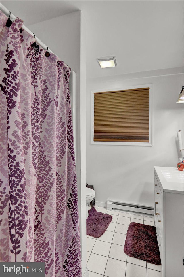 full bathroom featuring a baseboard radiator, toilet, curtained shower, tile patterned flooring, and vanity