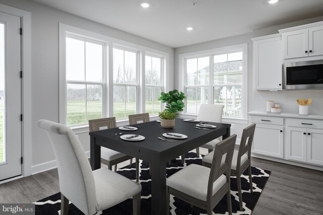 1219 Bear Branch Rd, Laurel, MD 20708 - dining room with recessed lighting, baseboards, and wood finished floors