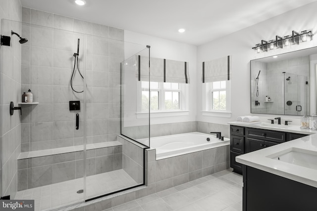 1219 Bear Branch Rd, Laurel, MD 20708 - full bathroom with vanity, recessed lighting, tile patterned floors, a bath, and a shower stall
