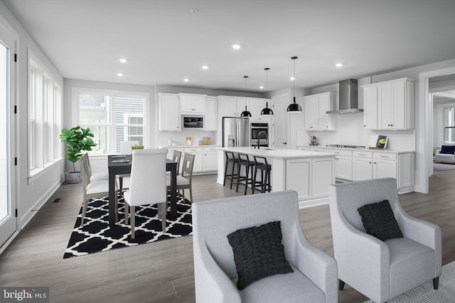 1219 Bear Branch Rd, Laurel, MD 20708 - living area with recessed lighting and wood finished floors