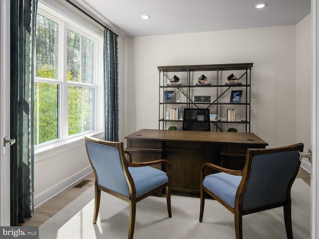 office area featuring baseboards, recessed lighting, wood finished floors, and visible vents