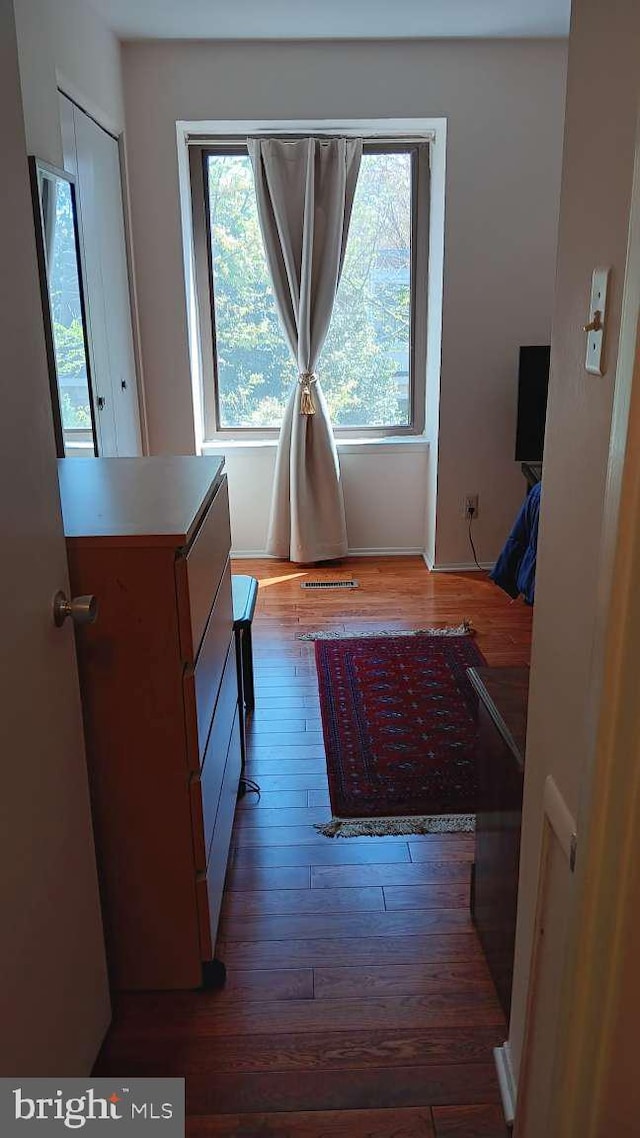 6010 Timber Hollow Ln, Springfield, VA 22152 - doorway with visible vents and hardwood / wood-style flooring