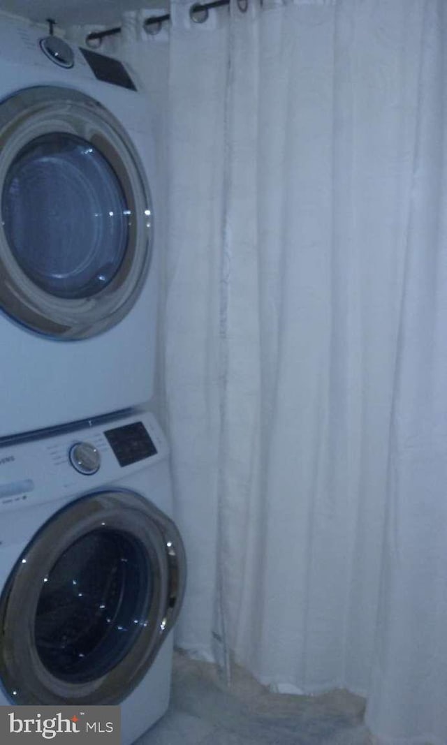 6010 Timber Hollow Ln, Springfield, VA 22152 - laundry area featuring laundry area and stacked washer / dryer