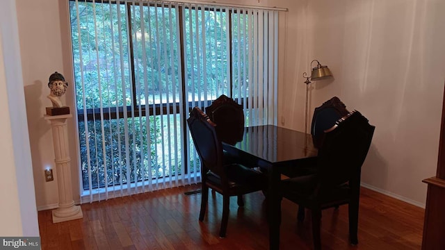 6010 Timber Hollow Ln, Springfield, VA 22152 - dining space with ornate columns, baseboards, and wood finished floors