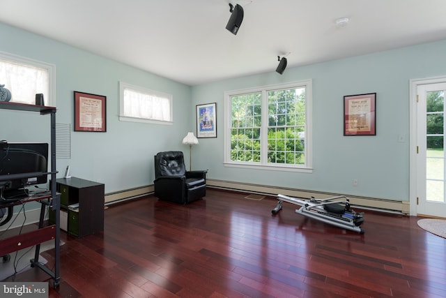 77 N Main St, Cranbury, NJ 08512 - sitting room with wood finished floors, a baseboard heating unit, and healthy amount of natural light
