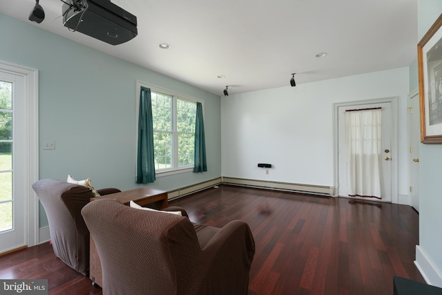 77 N Main St, Cranbury, NJ 08512 - living room with healthy amount of natural light, wood finished floors, recessed lighting, a baseboard heating unit, and baseboards