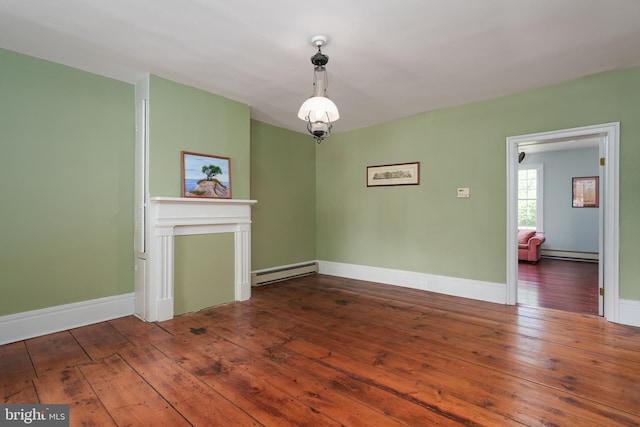 interior space featuring wood-type flooring, baseboards, a baseboard heating unit, and a baseboard radiator