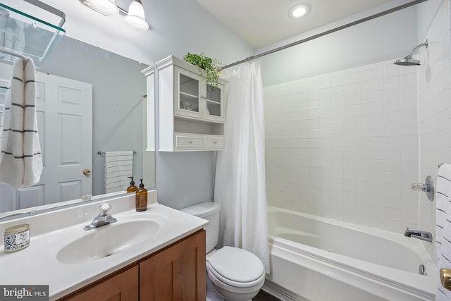 250 S Bouldin St, Baltimore, MD 21224 - bathroom featuring toilet, shower / bathtub combination with curtain, and vanity