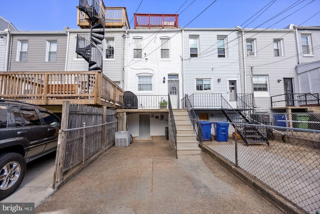 250 S Bouldin St, Baltimore, MD 21224 - rear view of property featuring stairway and fence