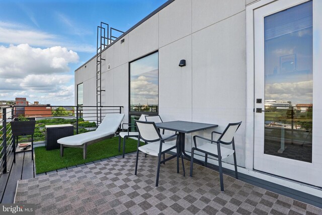 view of patio / terrace with a balcony
