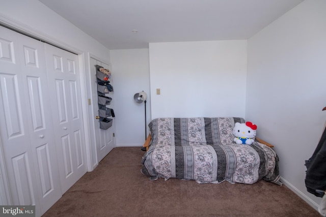 sitting room with carpet flooring and baseboards