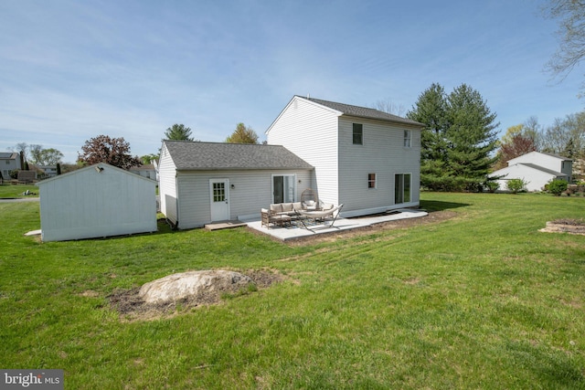 back of house with a yard and a patio area