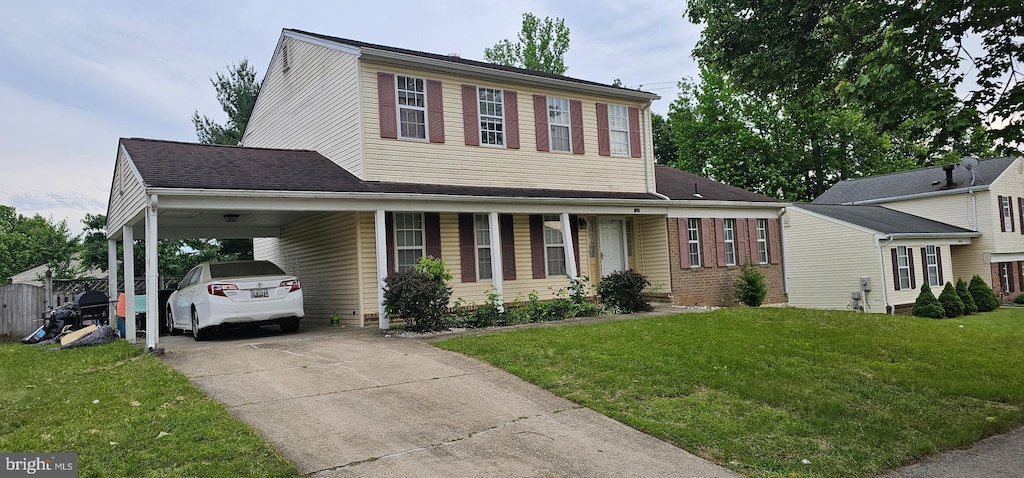 10907 Atwell Ave, Bowie, MD 20720 - view of front facade with driveway, a front yard, and a carport
