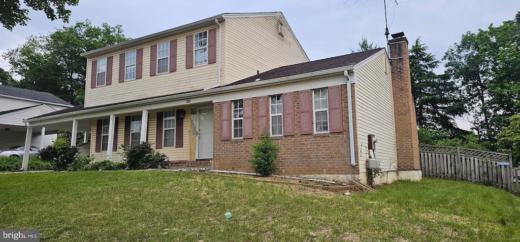 10907 Atwell Ave, Bowie, MD 20720 - view of front of home featuring a chimney, a porch, and brick siding