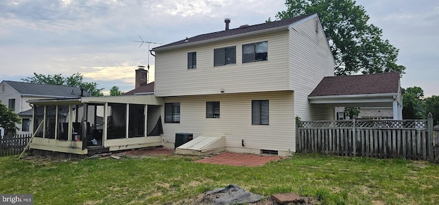 10907 Atwell Ave, Bowie, MD 20720 - rear view of property featuring a sunroom, cooling unit, and a chimney