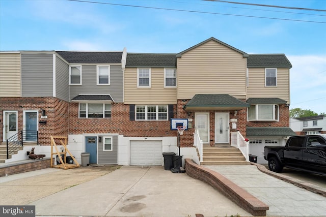 11757 Dimarco Dr, Philadelphia, PA 19154 - townhome / multi-family property with an attached garage, driveway, and roof with shingles