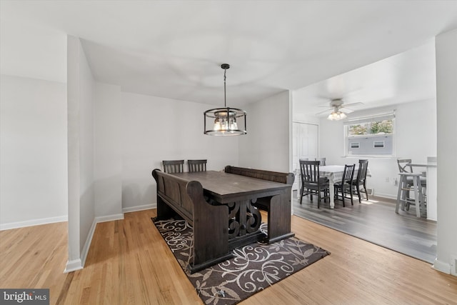 11757 Dimarco Dr, Philadelphia, PA 19154 - dining room featuring wood finished floors, a ceiling fan, baseboards, and a chandelier