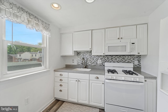 11757 Dimarco Dr, Philadelphia, PA 19154 - kitchen with white appliances, a sink, white cabinetry, backsplash, and recessed lighting