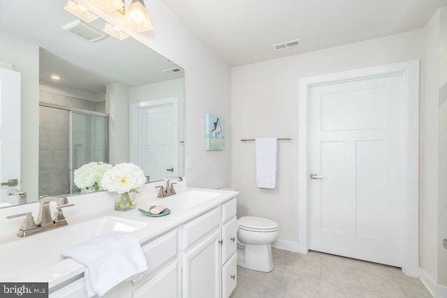 28020 Dew Drop Ln, Millville, DE 19967 - bathroom featuring visible vents, a sink, double vanity, and a shower stall