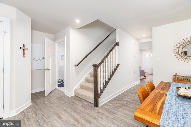 28020 Dew Drop Ln, Millville, DE 19967 - stairway featuring recessed lighting, baseboards, and wood finished floors