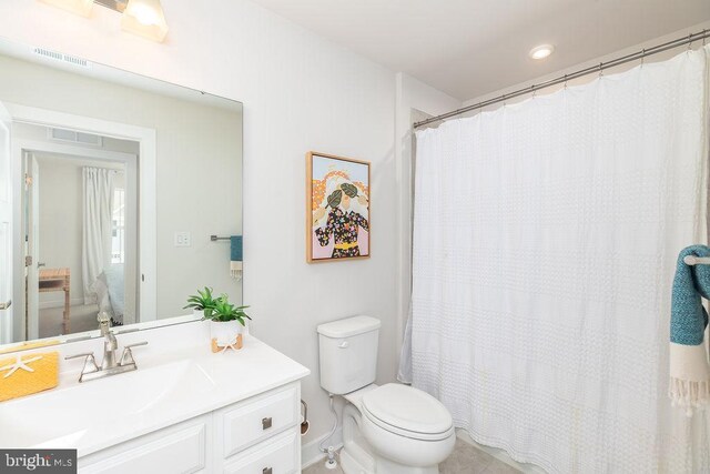 28020 Dew Drop Ln, Millville, DE 19967 - full bathroom with toilet, visible vents, and vanity