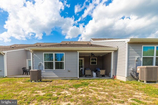 28020 Dew Drop Ln, Millville, DE 19967 - back of property featuring ceiling fan, a patio area, and central air condition unit
