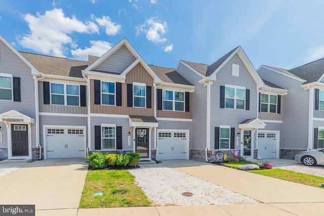 28020 Dew Drop Ln, Millville, DE 19967 - multi unit property featuring an attached garage, driveway, and stone siding