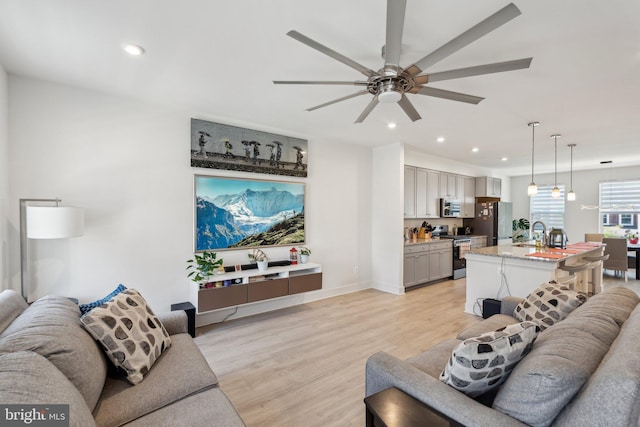 1490 Meadowlark Glen Rd, Dumfries, VA 22026 - living area featuring a ceiling fan, light wood-style flooring, recessed lighting, and baseboards