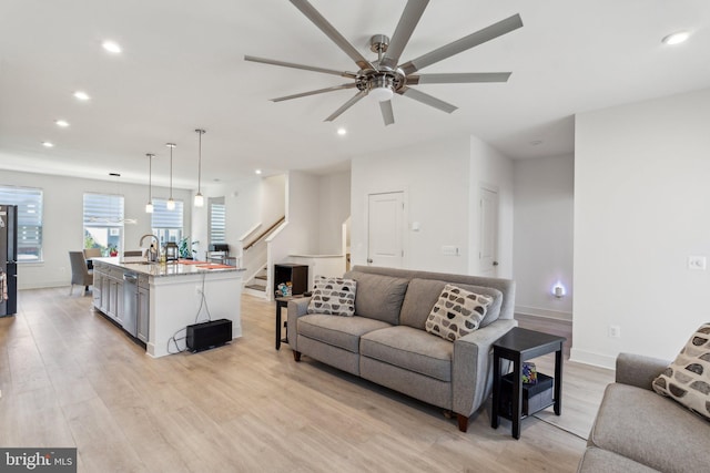 1490 Meadowlark Glen Rd, Dumfries, VA 22026 - living area featuring recessed lighting, light wood-style floors, a ceiling fan, stairway, and baseboards