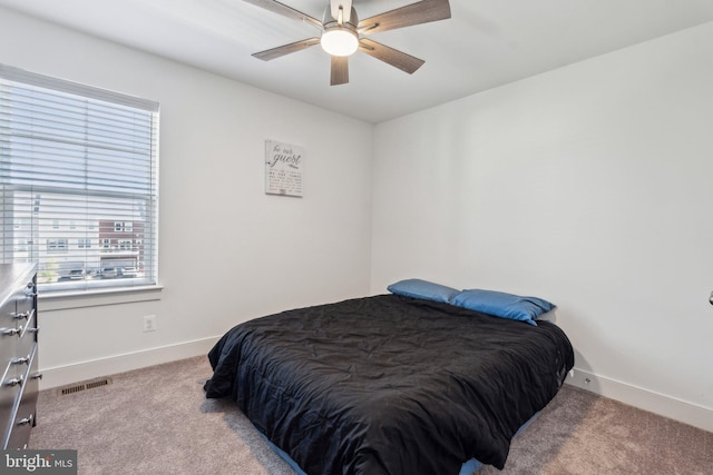 1490 Meadowlark Glen Rd, Dumfries, VA 22026 - carpeted bedroom featuring baseboards and ceiling fan