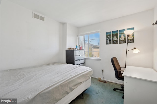 bedroom featuring baseboards, carpet, and visible vents