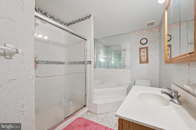 bathroom featuring tile patterned flooring, vanity, a shower stall, visible vents, and a bath
