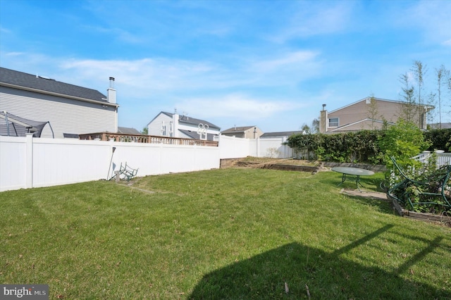 view of yard featuring fence