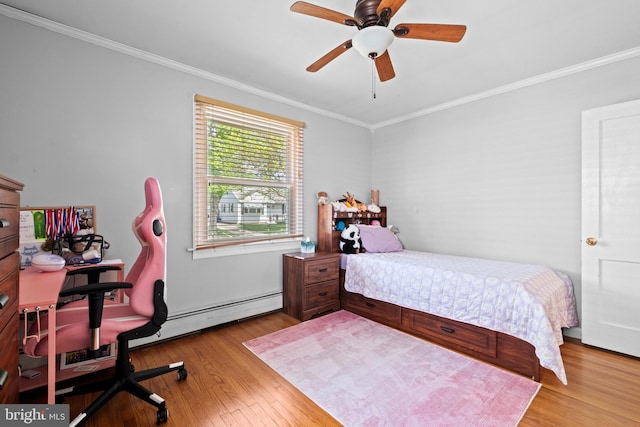 bedroom featuring ornamental molding, ceiling fan, and wood finished floors