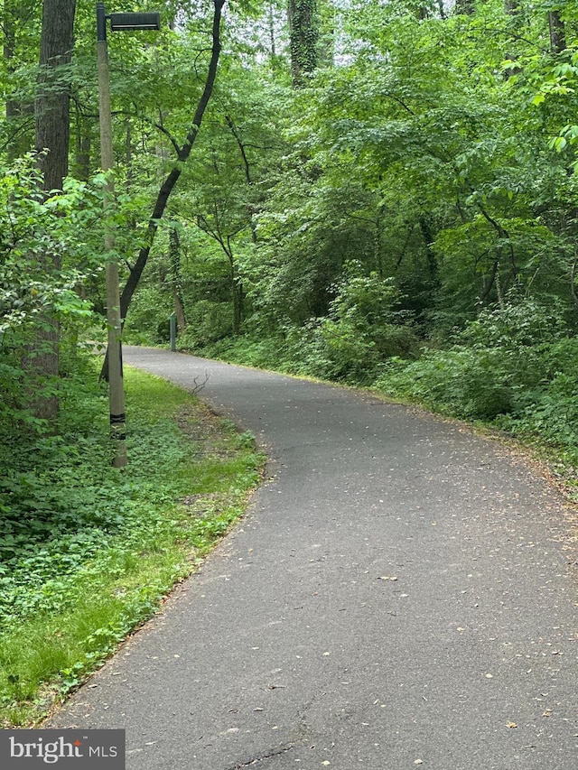 surrounding community with a view of trees