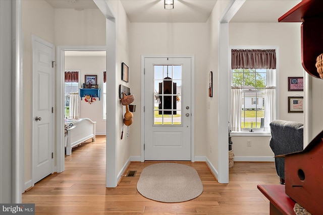 38284 Clearwater Ct, Ocean View, DE 19970 - foyer entrance with baseboards, light wood-style floors, and visible vents