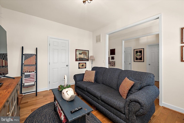 38284 Clearwater Ct, Ocean View, DE 19970 - living area featuring light wood-type flooring, baseboards, and visible vents