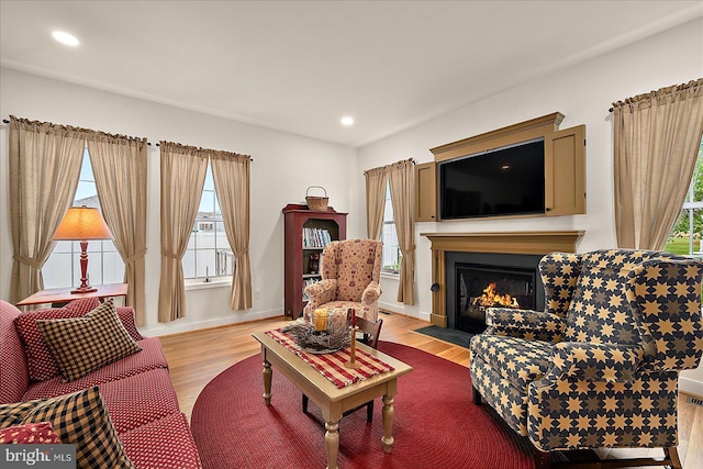 38284 Clearwater Ct, Ocean View, DE 19970 - living area with recessed lighting, a fireplace with flush hearth, and wood finished floors