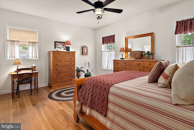 38284 Clearwater Ct, Ocean View, DE 19970 - bedroom featuring baseboards, light wood finished floors, and ceiling fan