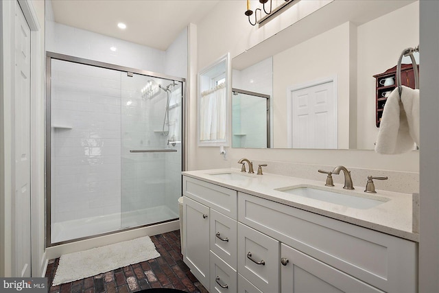 38284 Clearwater Ct, Ocean View, DE 19970 - full bath featuring a sink, double vanity, brick floor, and a stall shower