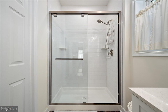 38284 Clearwater Ct, Ocean View, DE 19970 - bathroom with a shower stall, vanity, and toilet