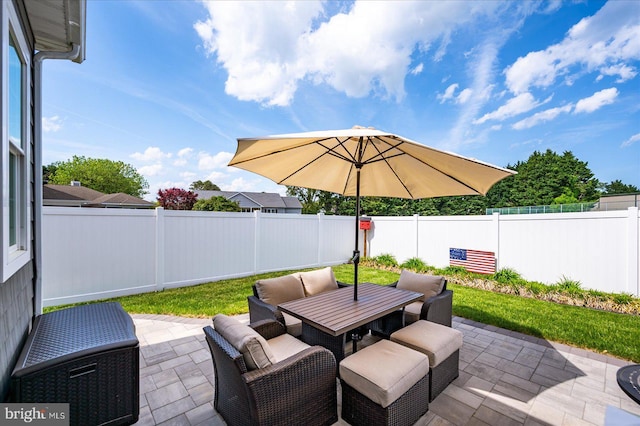 38284 Clearwater Ct, Ocean View, DE 19970 - view of patio featuring outdoor dining area and a fenced backyard